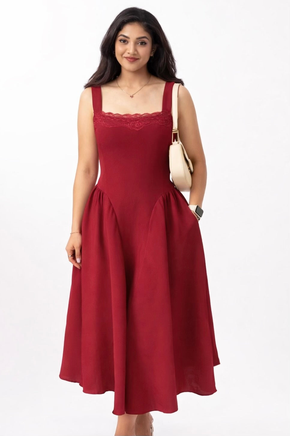 Woman wearing a red dress with a white background